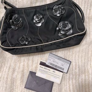Prada “Tessuto fiori” nylon purse with flowers